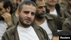 Ahmed Daqamseh, a Jordanian soldier convicted of killing seven Israeli schoolgirls, March 13, 1997, is seen at Um Alluol prison in Mafraq, Jordan, Aug. 7, 2012.