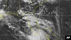 Badai Tropis Sally, diperkirakan akan mencapai kekuatan badai, Senin, 14 September 2020, saat mendekati Pantai Teluk AS. (NOAA melalui AP)