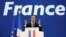 Emmanuel Macron, head of the political movement En Marche !, or Onwards !, and candidate for the 2017 French presidential election, gestures to supporters after the first round of 2017 French presidential election in Paris, April 23, 2017. 