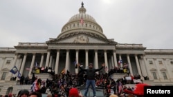 FILE PHOTO: Supporters of U.S. President Donald Trump gather in Washington