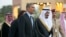 Saudi Arabia's Crown Prince Salman bin Abdulaziz Al Saud, escort President Barack Obama to his meeting with Saudi King Abdullah at Rawdat Khuraim, Saudi Arabia, March 28, 2014.
