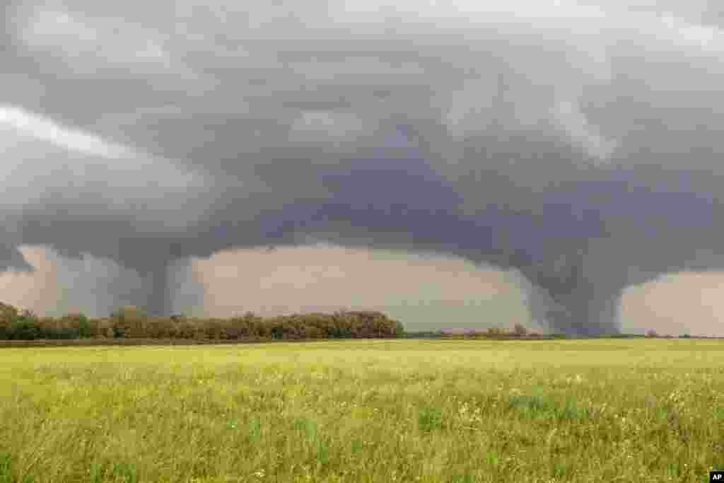 Two tornados approach Pilger, Nebraska, June 16, 2014. The National Weather Service said at least two twisters touched down within roughly a mile of each other in northeast Nebraska.