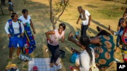 People celebrate South Africa&#39;s Heritage Day at Zoo Lake park in Johannesburg.
