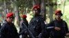 FILE - Indonesian Army's Kopassus special forces patrol outside the venues of the Asia-Pacific Economic Cooperation (APEC) Summit in Bali, Oct. 5, 2013. 