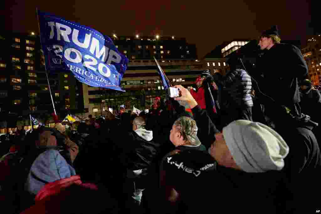 People attend a rally at Freedom Plaza Jan. 5, 2021, in Washington, in support of President Donald Trump. 