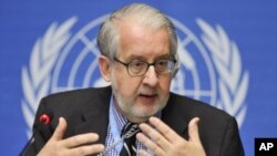 Chairperson of the Commission of Inquiry on Syria, Professor Paulo Pinheiro gestures during a press conference ahead of his mission on at the United Nations office in Geneva, September 30, 2011.