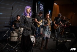 AI robot frontwoman "Desdemona" by Hanson Robotics performs during the world's largest gathering of humanoid AI Robots as part of International Telecommunication Union (ITU) AI for Good Global Summit in Geneva, on July 5, 2023.