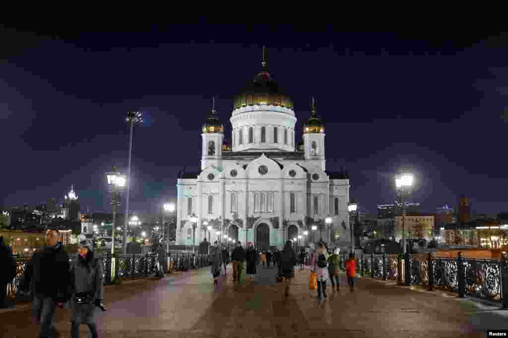 The Cathedral of Christ the Saviour is seen before the lights are switched off for Earth Hour in Moscow, March 30, 2019.