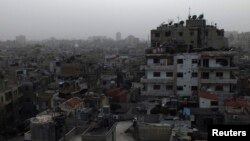 Homs, que l'armée syrienne tente de reprendre aux rebelles