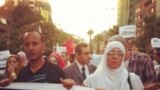 A crowd of an estimated 2000 Egyptian protesters are crossing the Nile River on June 15th, 2012 in Cairo.