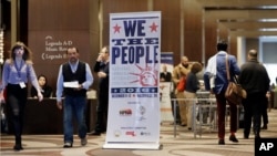 People attend the National Immigrant Integration Conference, Dec. 12, 2016, in Nashville, Tennessee. The gathering of immigration advocates was meant to be a celebration of recent gains. Now it may turn into a strategy session for defending advances against a Trump presidency. 