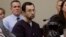 FILE - Larry Nassar sits during his sentencing hearing in Lansing, Michigan, Jan. 24, 2018. 