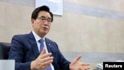 South Korean Agriculture Minister Chung Hwang-keun speaks during an interview with Reuters in Seoul