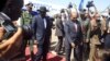 Sudan’s President Omar al-Bashir, right, welcomes South Sudan's President Salva Kiir at Khartoum airport, Sudan, Nov. 1, 2017.