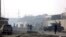 FILE - Afghan security forces gather at the site a day after an attack in Kabul, Afghanistan, Tuesday, Jan. 15, 2019.