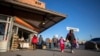 Pedestrians arrive at downtown El Paso, Texas, after crossing from Ciudad Juarez, Mexico, Jan. 19, 2025.