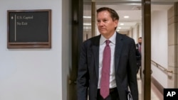 FILE - In this Oct. 4, 2019, photo, Michael Atkinson, the inspector general of the intelligence community, arrives at the Capitol in Washington.