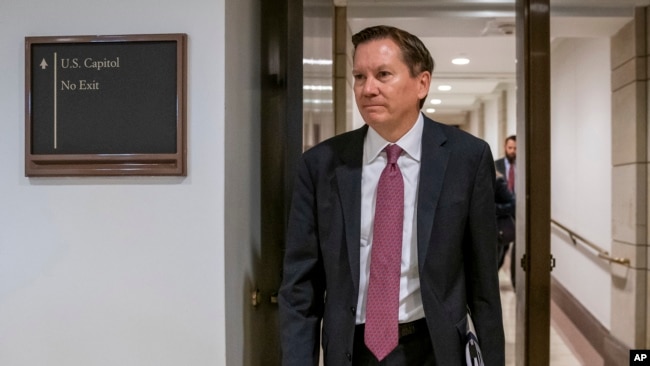 FILE - In this Oct. 4, 2019, file photo, Michael Atkinson, the inspector general of the intelligence community, arrives at the Capitol in Washington for closed-door questioning about a whistleblower complaint that triggered President Donald Trump's…