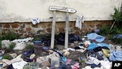 Belongings of people killed during the post-election conflict in Ivory Coast as they took refuge in Blolekin's Prefecture, are seen during a UN media tour May 8, 2011