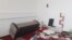 Freelance journalist Lucy Kassa says her home in Addis Ababa was raided by three armed men dressed in civilian clothes. The aftermath of that raid is seen in this photo from WhatsApp. 