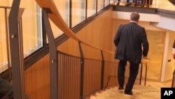 In this grab taken from video Iceland's Prime Minister Sigmundur David Gunnlaugsson leaves after holding a meeting at Iceland's Parliament in Reykjavik, April 5, 2016. 