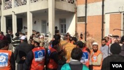 Emergency responders on scene of attack at Bacha Khan University in Charsadda, Pakistan, Jan. 20, 2016. (Photo: N. Takar / VOA Deewa) 