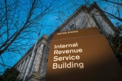 FILE - The headquarters of the Internal Revenue Service in Washington.