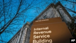 FILE - The headquarters of the Internal Revenue Service in Washington, Apr. 13, 2014.