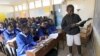 Pupils revise their class work without a teacher on the second week of a national teachers' strike, at Olympic Primary School in Kenya's capital Nairobi, September 9, 2015. 