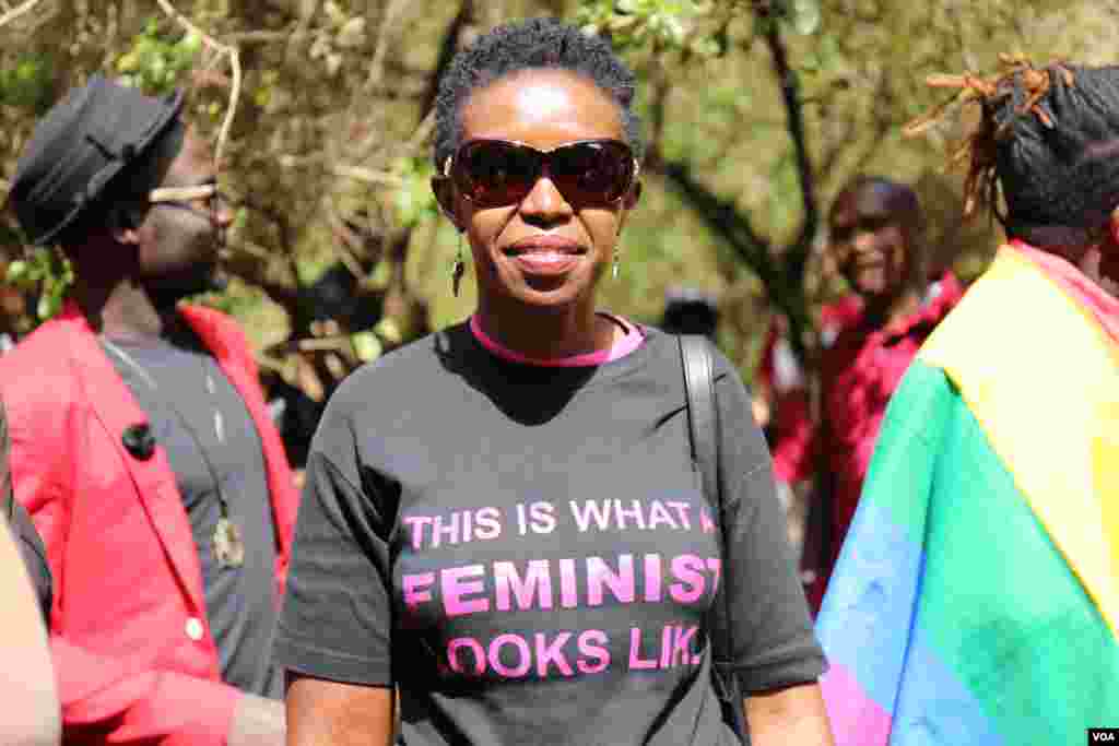 A participant in the Women's march through Nairobi's Karura forest wears a t-shirt that says "this is what feminist looks like", in Kenya, Jan. 21, 2017. (Photo: J.Craig/VOA)