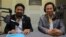 Ou Chanroth (left), a former member of Parliament from the Cambodia National Rescue Party (CNRP) and Chheang Vun (right), a member of Parliament from the Cambodian People's Party (CPP), on Hello VOA call-in show, Phnom Penh, Cambodia, Tuesday, May 31, 2016. (Lim Sothy/VOA Khmer) 