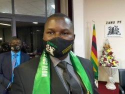 FILE - Tafadzwa Mugwadi, director of information for Zimbabwe’s ruling ZANU-PF party, says the removal of a running mate clause was meant to ensure a president can choose his vice presidents, pictured in Harare, Sept. 2020. (Columbus Mavhunga/VOA)