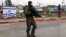 FILE - Israeli soldiers stand at the scene of an alleged stabbing attempt at Gush Etzion junction in the West Bank, Dec. 1, 2015. Near-daily violence has left more than 20 Israelis dead in the past three months.