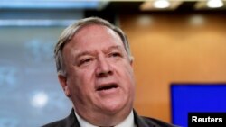 ARCHIVO - El Secretario de Estado de los Estados Unidos, Mike Pompeo, habla durante una sesión informativa conjunta sobre una orden ejecutiva del presidente de los Estados Unidos, Donald Trump, en la Corte Penal Internacional del Departamento de Estado.