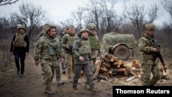 Ukraine's President Volodymyr Zelenskiy visits positions of armed forces near the frontline with Russian-backed separatists during his working trip in Donbass region, Ukraine April 8, 2021.