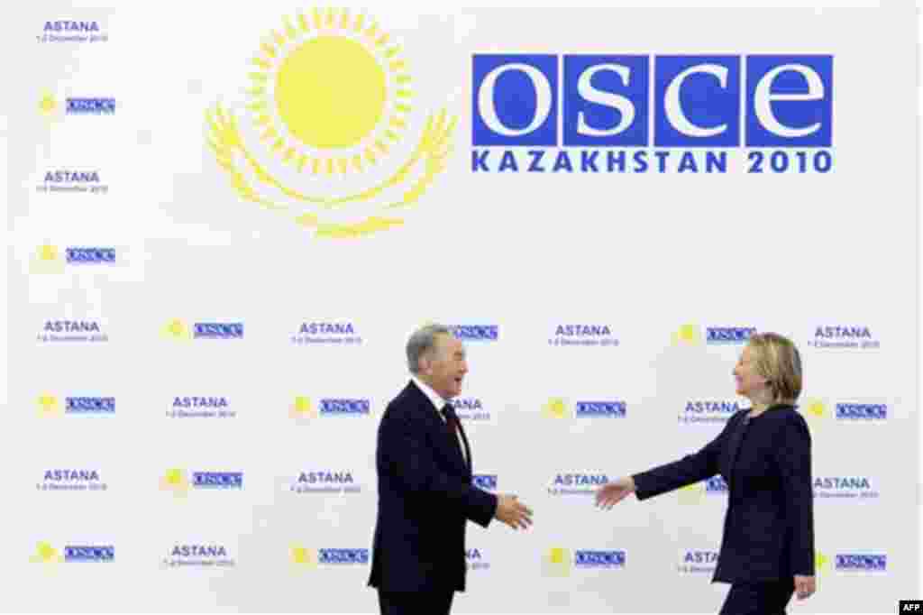 Kazakhstan's President Nursultan Nazarbayev, left, welcomes U.S. Secretary of State Hillary Rodham Clinton upon her arrival for the OSCE Summit at the Palace of Independence in Astana, Kazakhstan, Wednesday Dec. 1, 2010. The OSCE Summit offers a unique op