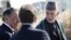 Afghanistan President Hamid Karzai (R) walks alongside U.S. Defense Secretary Leon Panetta (L) on a guided tour of the Pentagon Memorial, in memory of the victims of the September 11 attack, at the Pentagon, January 10, 2013.