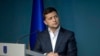 FILE - Ukrainian President Volodymyr Zelenskiy speaks during a meeting with law enforcement officers in Kyiv, Ukraine, July 23, 2019. 