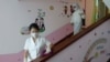 In this June 30, 2021, file photo, staff of the Pyongyang Primary School No. 4 clean stairwells in Pyongyang, North Korea. Pyongyang has not reported any COVID-19 cases since the pandemic began in late December 2019. 