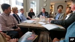 Republican gubernatorial candidate, Ed Gillespie, top center, gestures during a kitchen table discussion at a private home in Toano, Va., March 21, 2017. Gillespie faces fellow Republicans, State Sen. Frank Wagner, and Corey Stewart in the June 13th prim