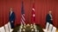 FILE - U.S. Secretary of State John Kerry, left, and Turkish Foreign Minister Mevlut Cavusoglu prepare to take part in a meeting ahead of the G20 summit in Hangzhou in eastern China's Zhejiang province, Sept. 3, 2016.