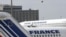 Air France planes are parked at Roissiy-Charles de Gaulle airport, north of Paris.