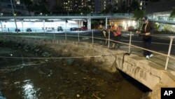Slovenia&#39;s players celebrate at the end of the Men&#39;s Ice Hockey Group A match Slovakia vs Slovenia at the Bolshoy Ice Dome during the Sochi Winter Olympics in Russia. Slovenia won 1-3.