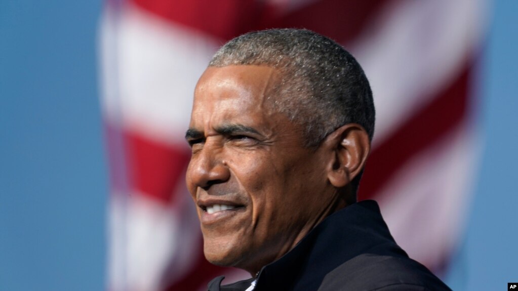 FILE - Former President Barack Obama campaigns for Democratic presidential candidate Joe Biden in Atlanta, Nov. 2, 2020. Obama has scaled down his 60th birthday bash due to the surge in the delta variant of the coronavirus.