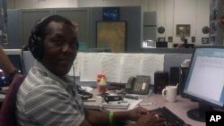 John Tanza busy at work at the VOA headquarters in Washington DC