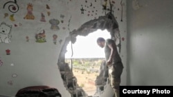 A hole was blown into the children’s room of Wasef Gelani's home during the war, in Tripoli, Libya, June 6, 2020. (Photo courtesy of Wasef Gelani)