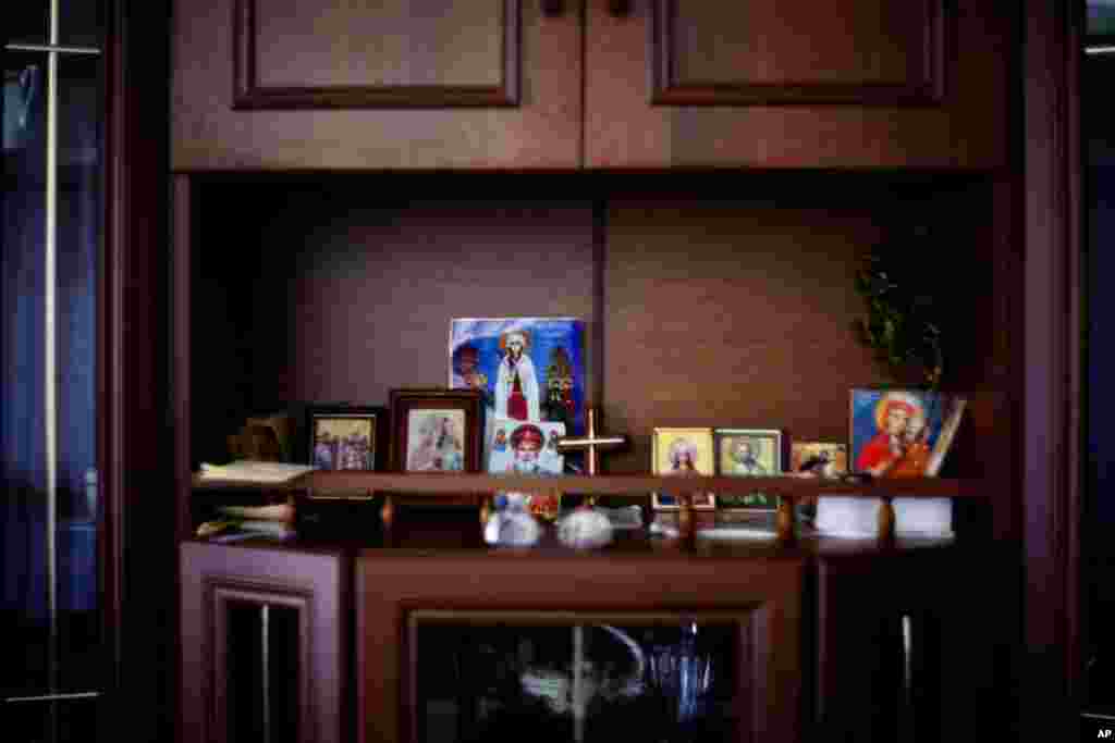 An altar inside a house at the refugee village. (Yuli Weeks for VOA)