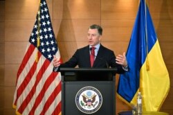 FILE - U.S. Special Envoy for Ukraine Kurt Volker speaks during a press-conference in Kyiv, Ukraine, July 27, 2019.