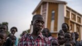 Steven, a young orphaned boy from the recent fighting who has lost his family stands on July 12, 2016 in Juba.