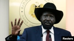 FILE: South Sudan President Salva Kiir gestures during a news conference in Juba, 12.18.2013